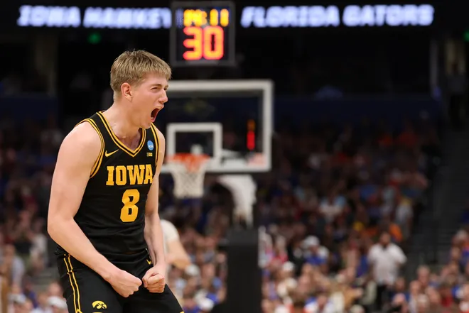 Mar 22, 2026; Tampa, FL, USA; Iowa Hawkeyes forward Cooper Koch (8) celebrates after a play against the Florida Gators in the second half during a second round game of the men's 2026 NCAA Tournament at Benchmark International Arena. Mandatory Credit: Matt Pendleton-Imagn Images