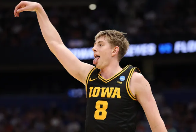 Mar 22, 2026; Tampa, FL, USA; Iowa Hawkeyes forward Cooper Koch (8) celebrates after a play against the Florida Gators in the second half during a second round game of the men's 2026 NCAA Tournament at Benchmark International Arena. Mandatory Credit: Nathan Ray Seebeck-Imagn Images