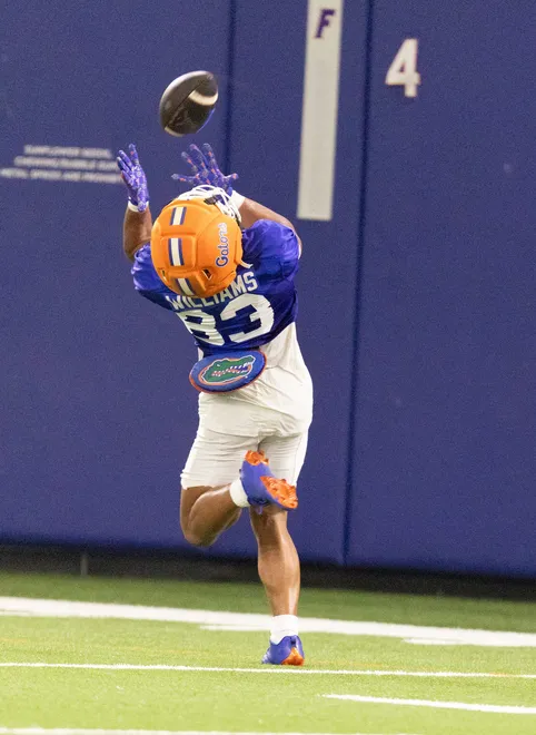 Florida wide receiver Justin Williams (83) catches during spring practice at Sanders Practice Fields in Gainesville, FL on Tuesday, March 24, 2026. [Alan Youngblood/Gainesville Sun]
