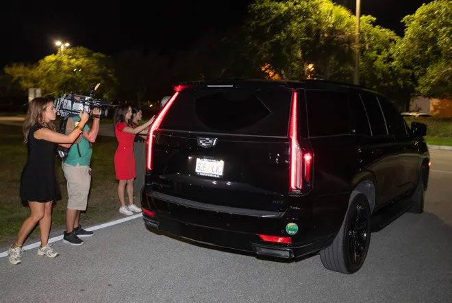 A vehicle carrying Tiger Woods leaves the Martin County Jail after he was arrested and charged with driving under the influence after a car crash on March 27, 2026 in Stuart, Florida.