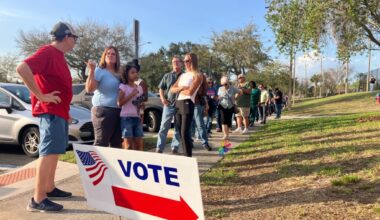 Voters wait in line at the Northwest Recreation Complex on the evening of March 10.