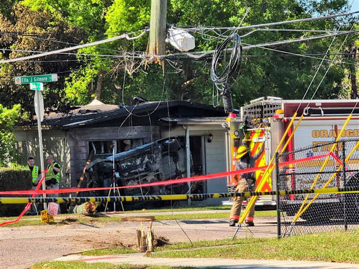 2 dead after car crashes into South Apopka home, catches fire