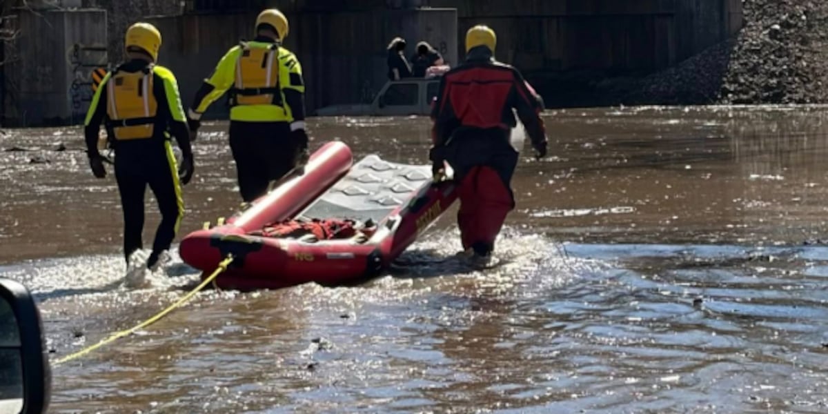 Three rescued after vehicle driven into flooded roadway in Miami County