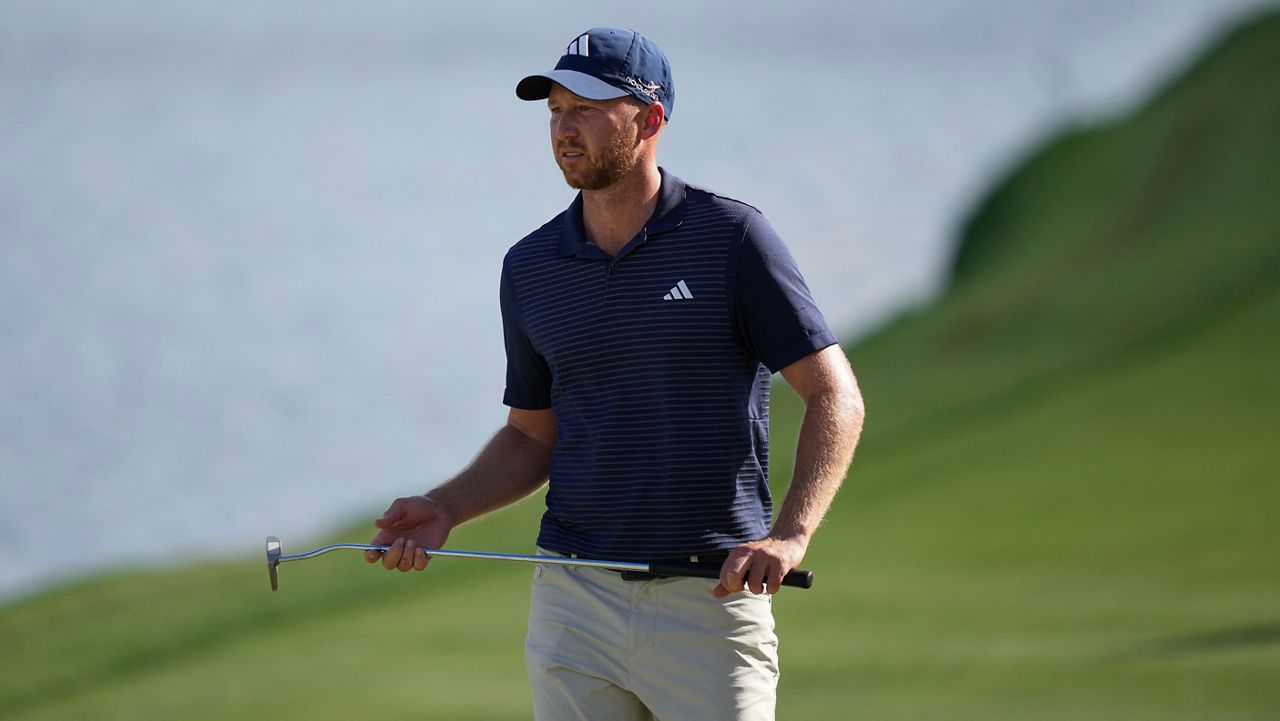 Daniel Berger walks up the 18th fairway during the second round of the Arnold Palmer Invitational at Bay Hill golf tournament Friday, March 6, 2026, in Orlando, Fla. (AP Photo/Matt Slocum)
