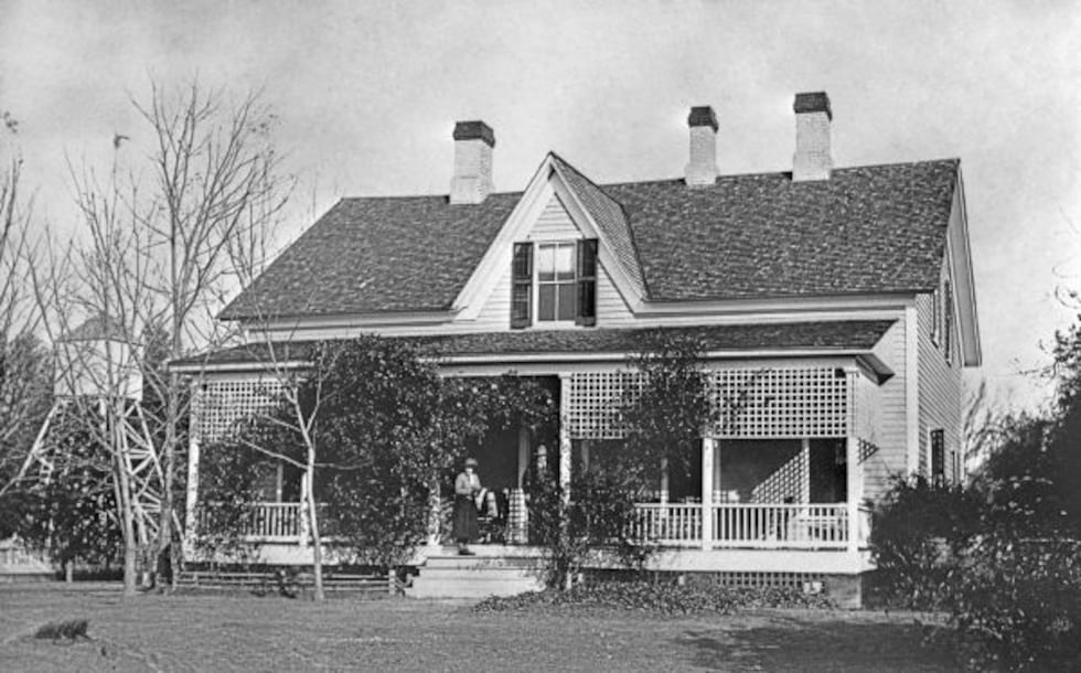 Ned and Genevieve on the porch of the main house, Florida Photographic Collection