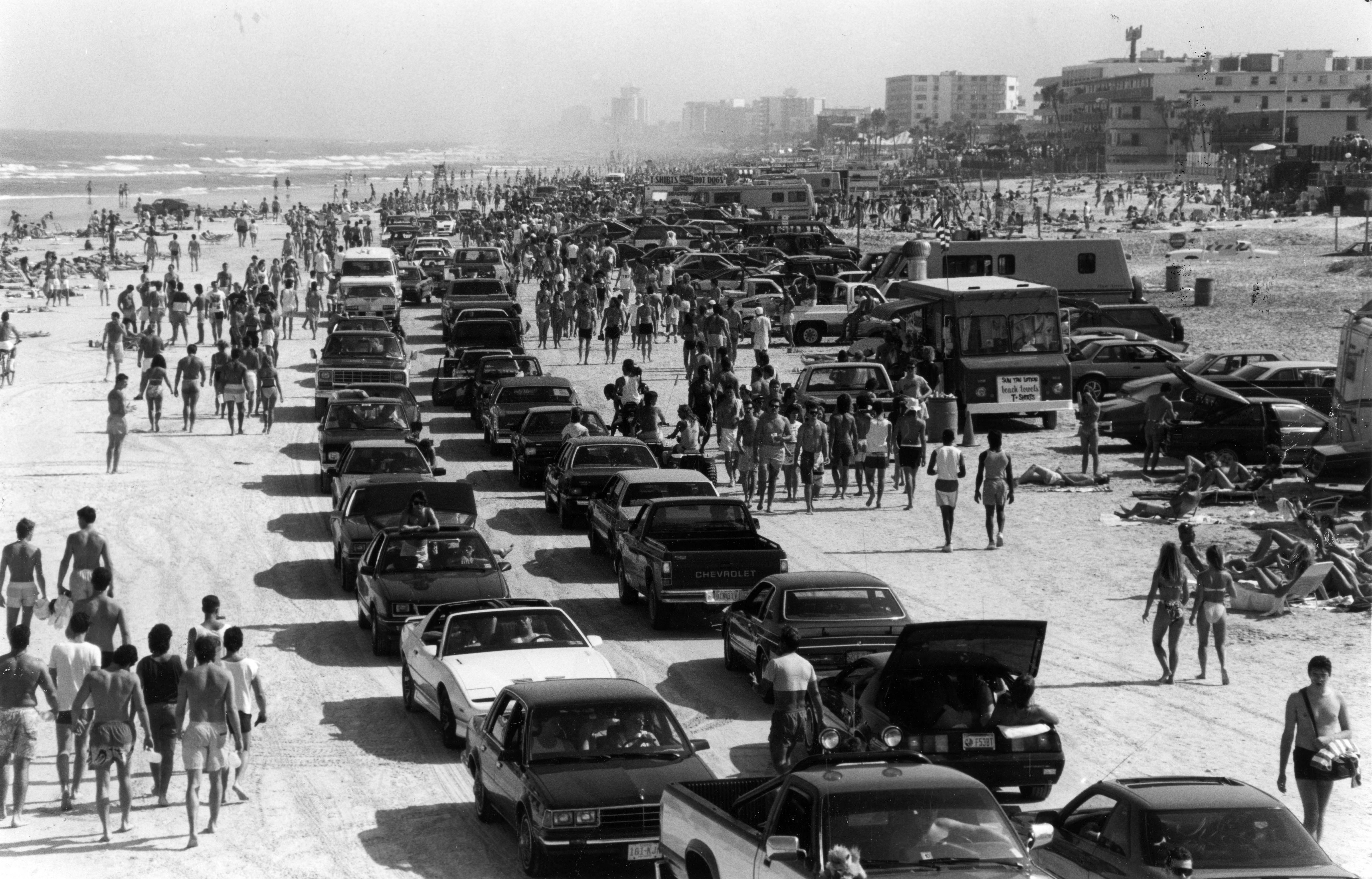 Driving on Daytona Beach looking south from Main St. Pier,...