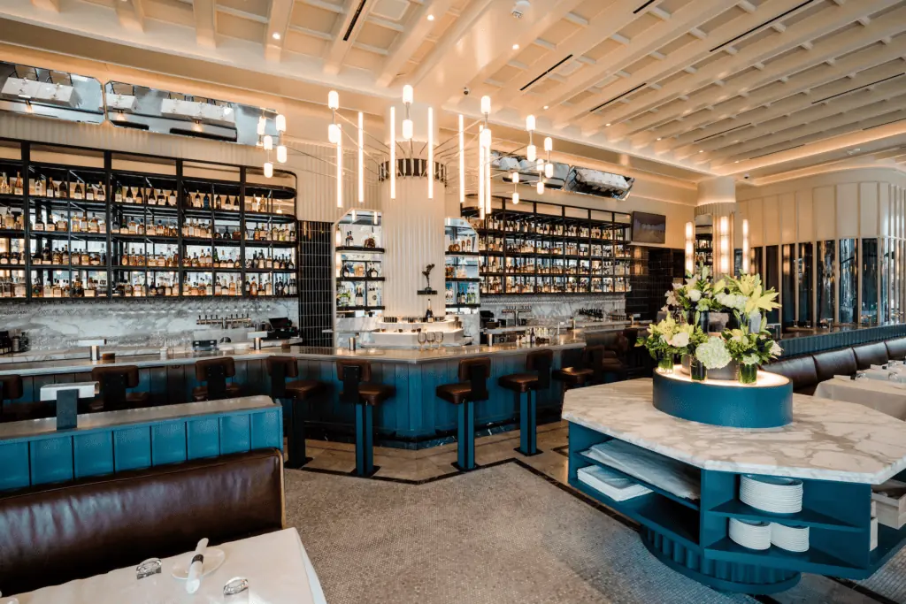 interior of a french restaurant with chic light fixtures 