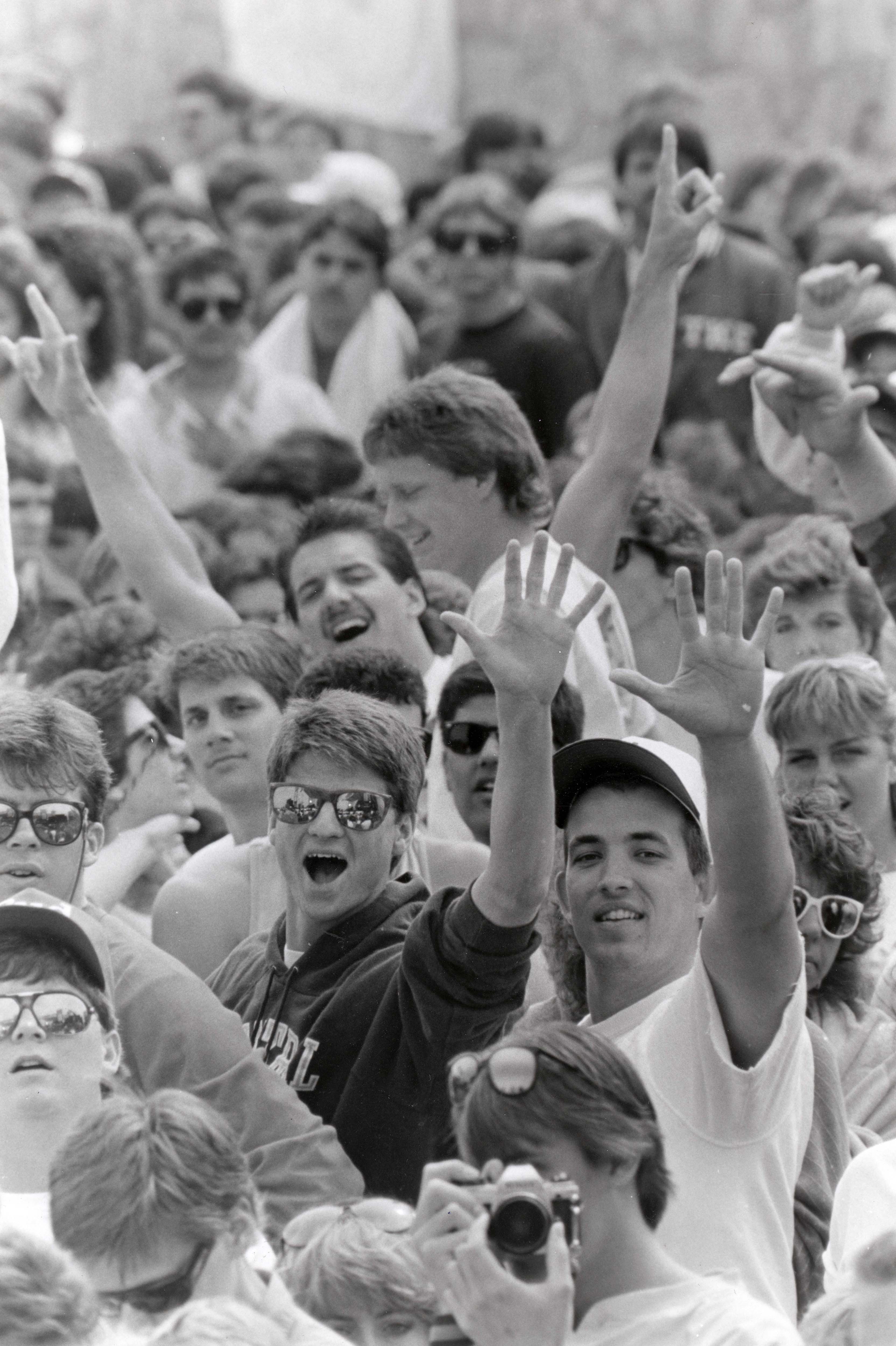 A crowd cheers at one of the many concerts scheduled...