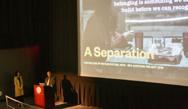 David Barrow Wiley and Laura Lee in front of a movie screen