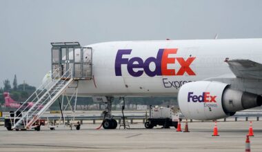 A FedEx cargo plane is shown on the tarmac at Fort Lauderdale-Hollywood International Airport, Tuesday, April 20, 2021, in Fort Lauderdale, Fla. (AP Photo/Wilfredo Lee, File)