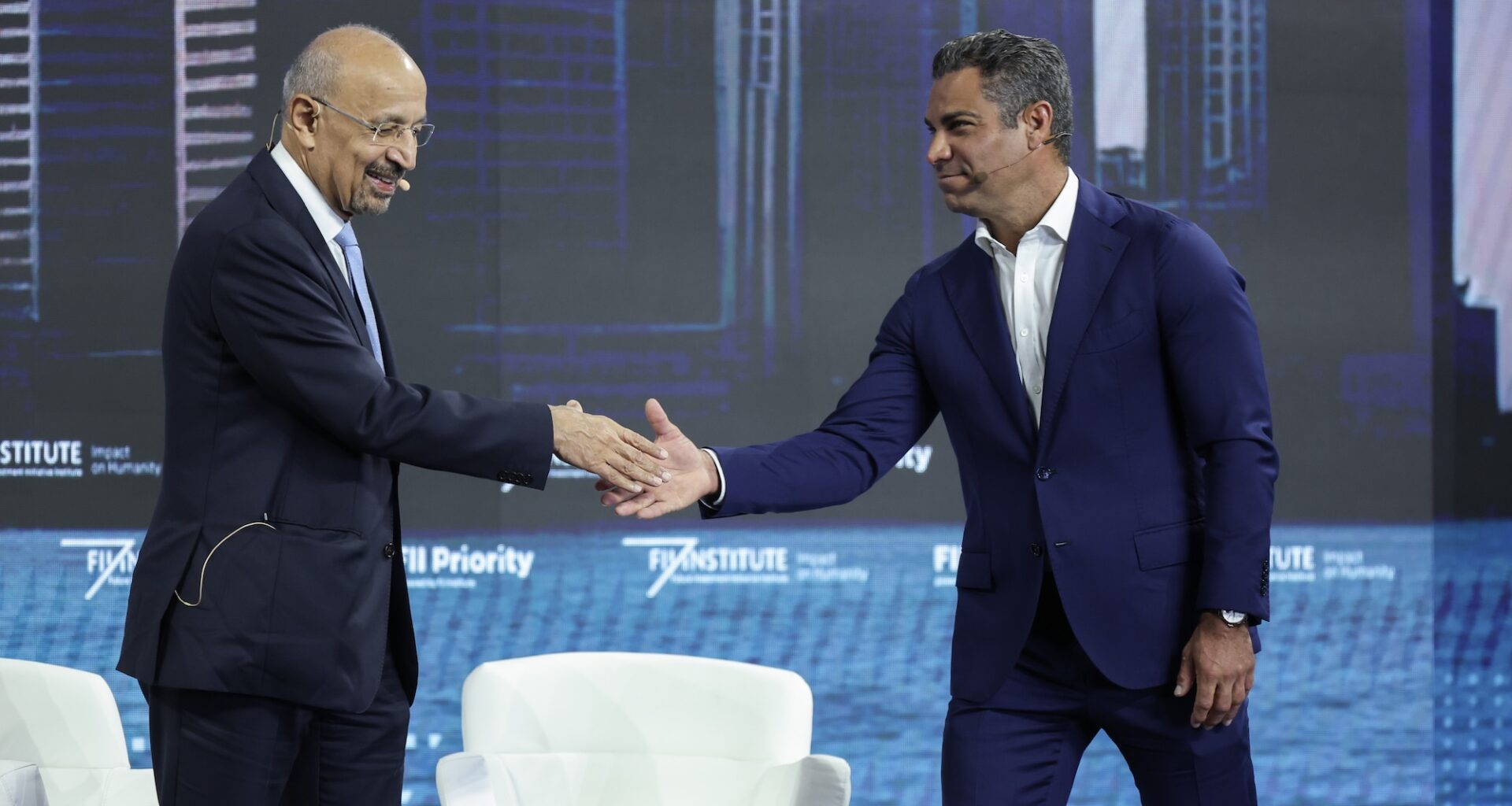 H.E. Khalid bin Abdulaziz Al-Falih, Minister of Investment, Ministry of Investment of Saudi Arabia and Mayor Francis Suarez of Miami, shake hands on stage at the FII Priority Summit last year.
