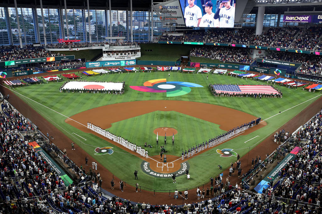 MIAMI, FLORIDA - MARCH 21: Team Japan and Team USA line up prior to the World Baseball Classic Championship at loanDepot park on March 21, 2023 in Miami, Florida.