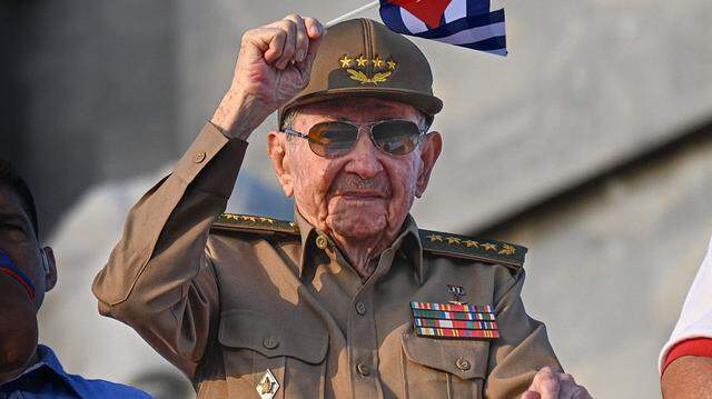 Cuba’s former President Raul Castro waves a Cuban national flag during the commemoration of May Day (Workers’ Day) at Havana’s Revolution Square on May 1, 2025