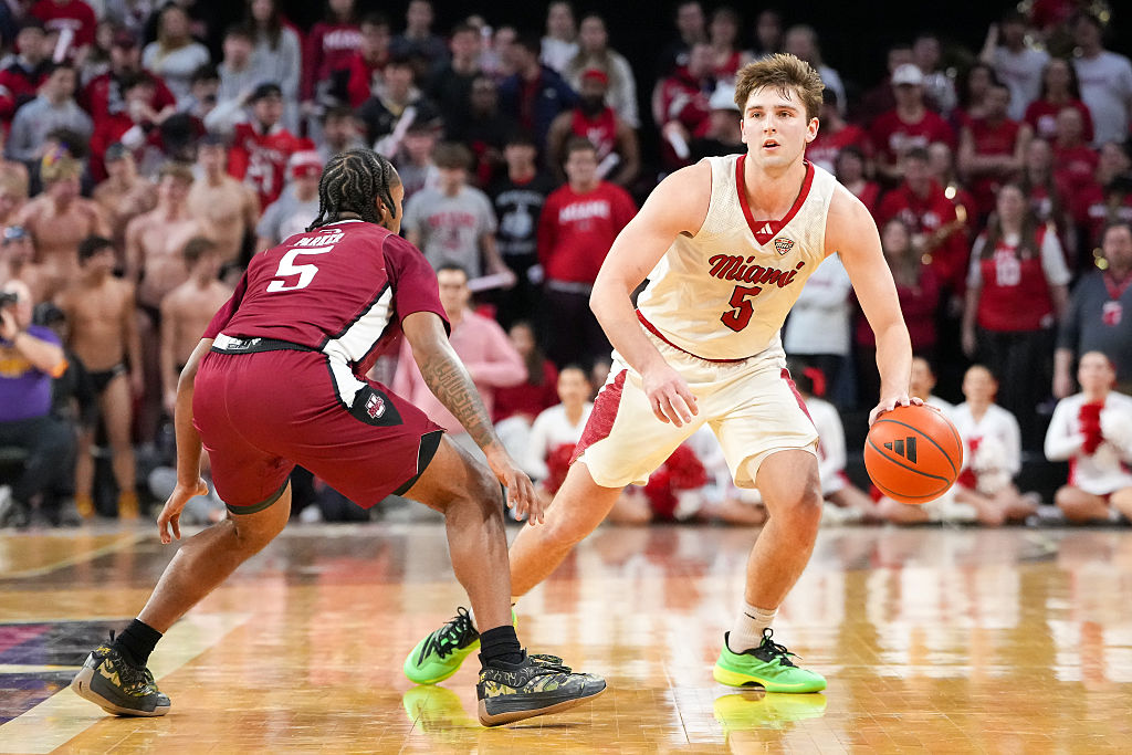 OXFORD, OHIO - JANUARY 27: Peter Suder #5 of the Miami (OH) RedHawks dribbles the ball while being guarded by K'Jei Parker #5 of the UMass Minutemen in the second half at Millett Hall on January 27, 2026 in Oxford, Ohio. (Photo by Dylan Buell/Getty Images)