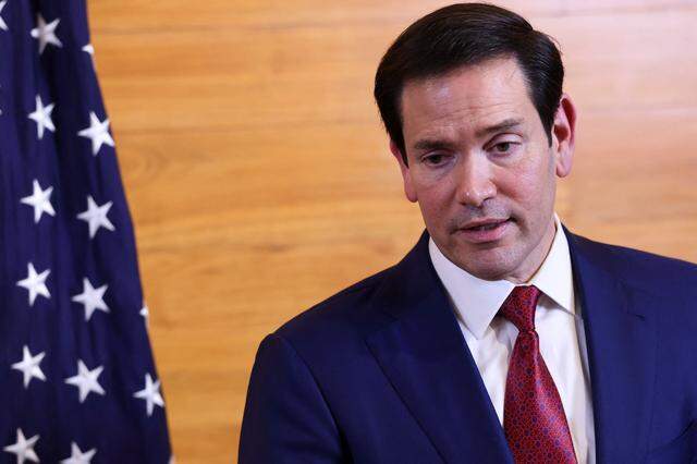 U.S. Secretary of State Marco Rubio speaks to reporters in a departure lounge before returning to Washington following meetings with Caribbean Community leaders in Saint Kitts and Nevis on Feb. 25, 2026. 
