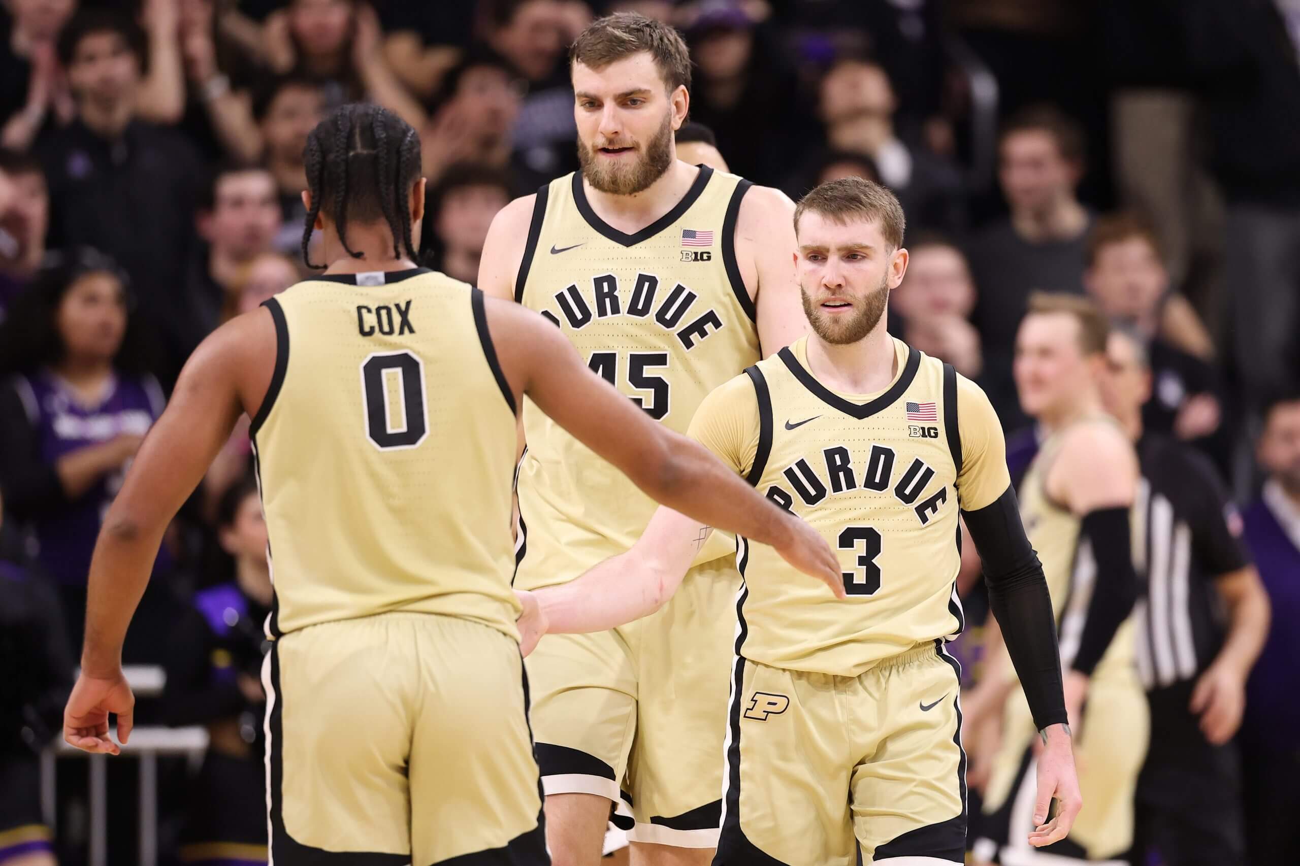 Braden Smith high-fives a teammate.
