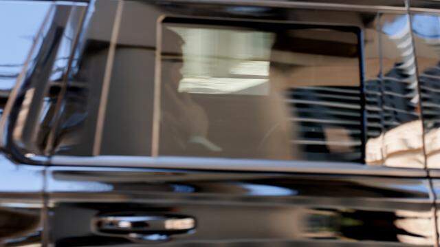 Secretary of State Marco Rubio speaks on a phone as he leaves the James Lawrence King Federal Justice Building on March 24, 2026, in Miami. 