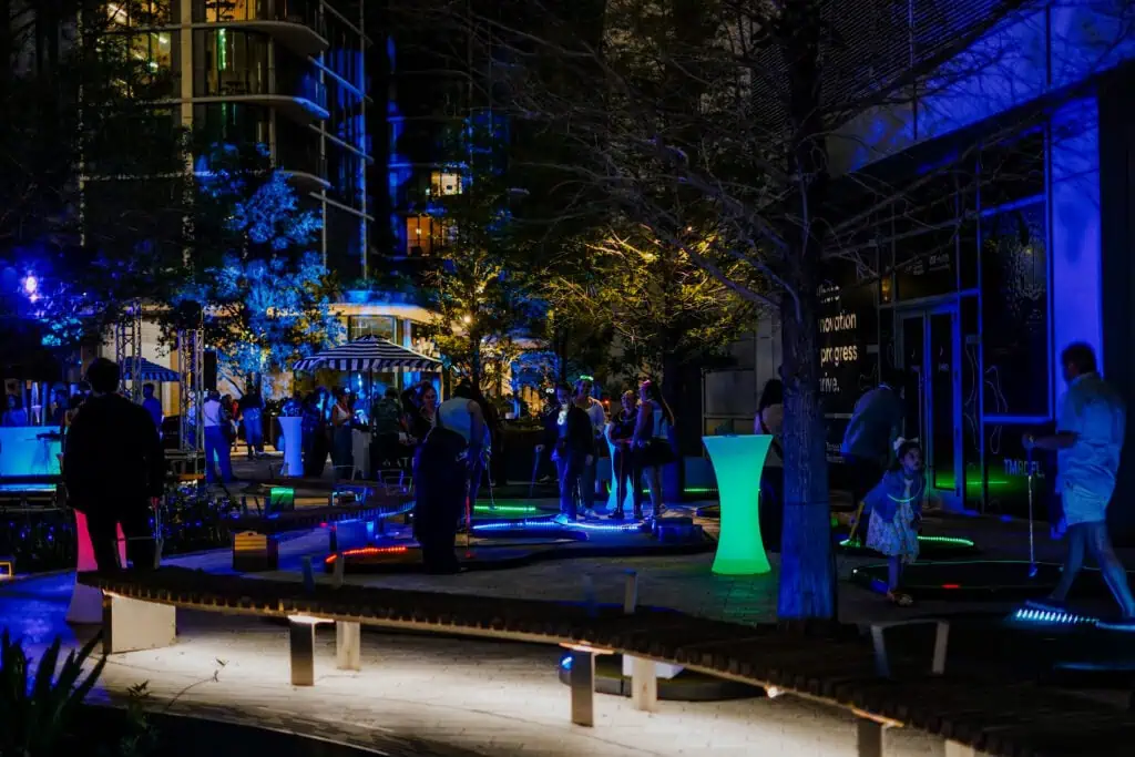 People playing putt putt