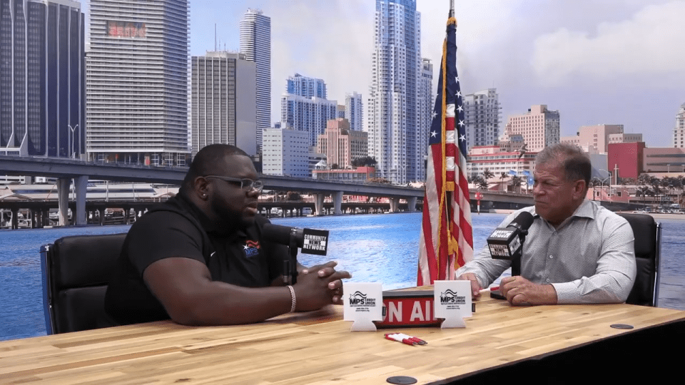 Grant Miller meets with Bryan Derrick from MPS Credit Union