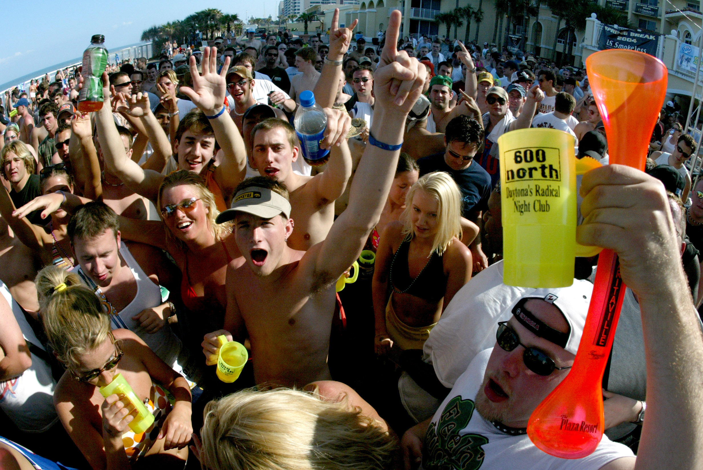 College students party on a Daytona Beach pool deck Sunday...