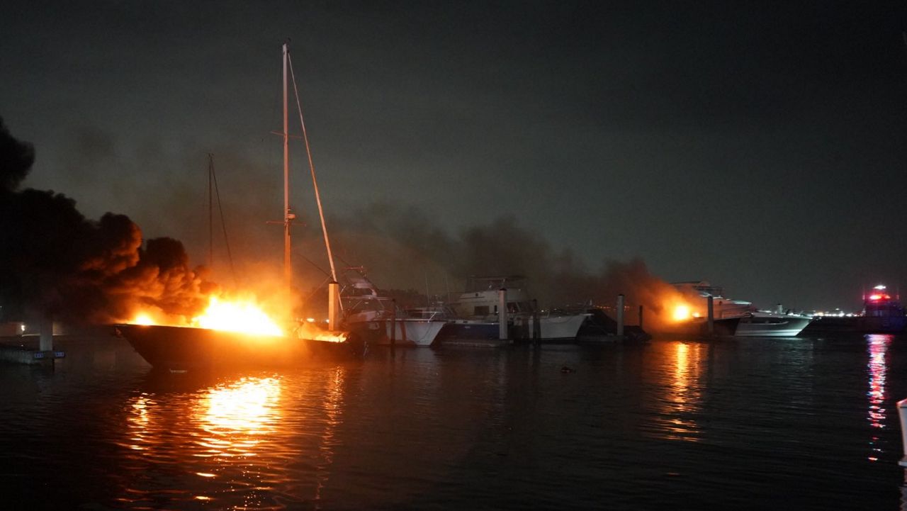 Several boats set ablaze at the Tampa Yacht and Country Club on Friday, March 13, 2026. (Courtesy: Tampa Fire Rescue)