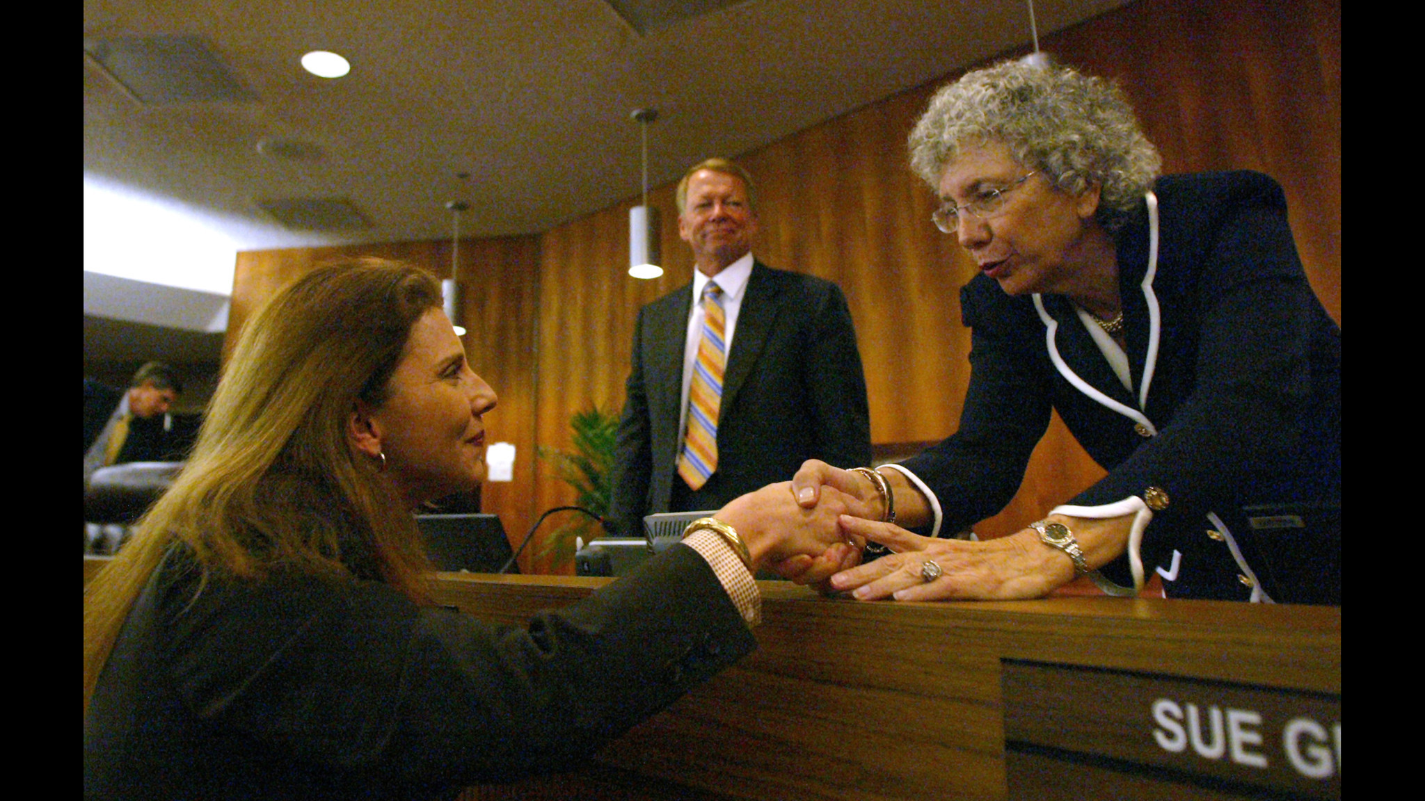 Catalina Avalos shakes hands with Broward County Commissioner for District...