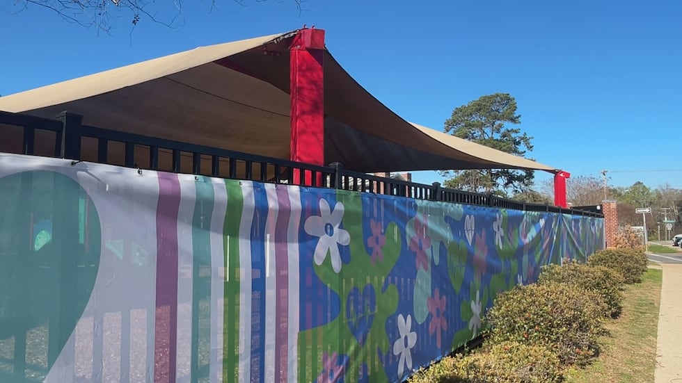 Artwork removed from Hartsfield Elementary's crosswalk last year is now featured on a wind...