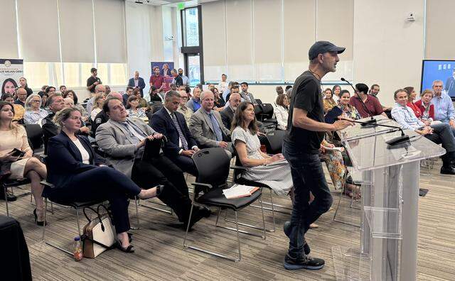 A Coral Gables resident speaks during a town hall in the city’s public safety building on Monday, March 9, 2026. Coral Gables Mayor Vince Lago, who hosted the town hall, was joined by Vice Mayor Rhonda Anderson, Miami-Dade County Commissioner Natalie Milian Orbis and Coral Gables City Attorney Cristina Suarez to discuss ballot questions that will appear in the upcoming vote-by-mail election.