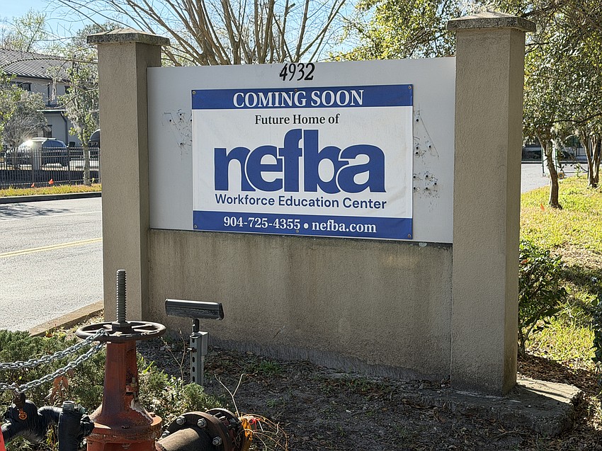 NEFBA signage outside the new facility building. Employees start work in the new facility on March 2.