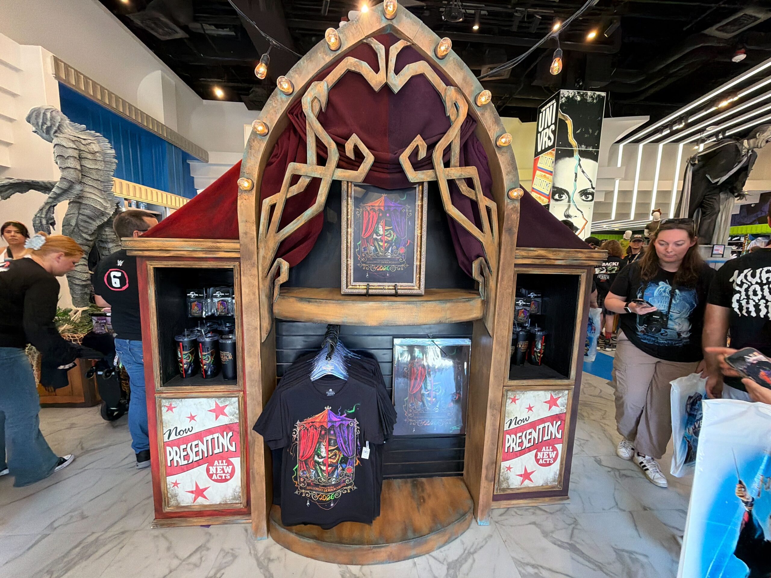 The new merchandise is housed in a thematic display, which we noticed this morning. It is themed to a side show attraction, befitting the HHN icons Jack and Dr. Oddfellow.