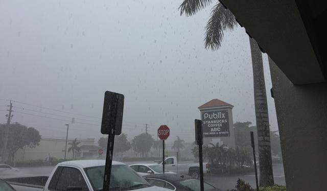 File photo of a rainy day at the Doral Park mall that has been anchored by a Publix supermarket since 1987 at 9755 NW 41st St.