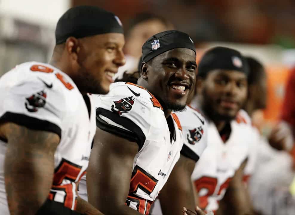 Football player, smiling for the camera