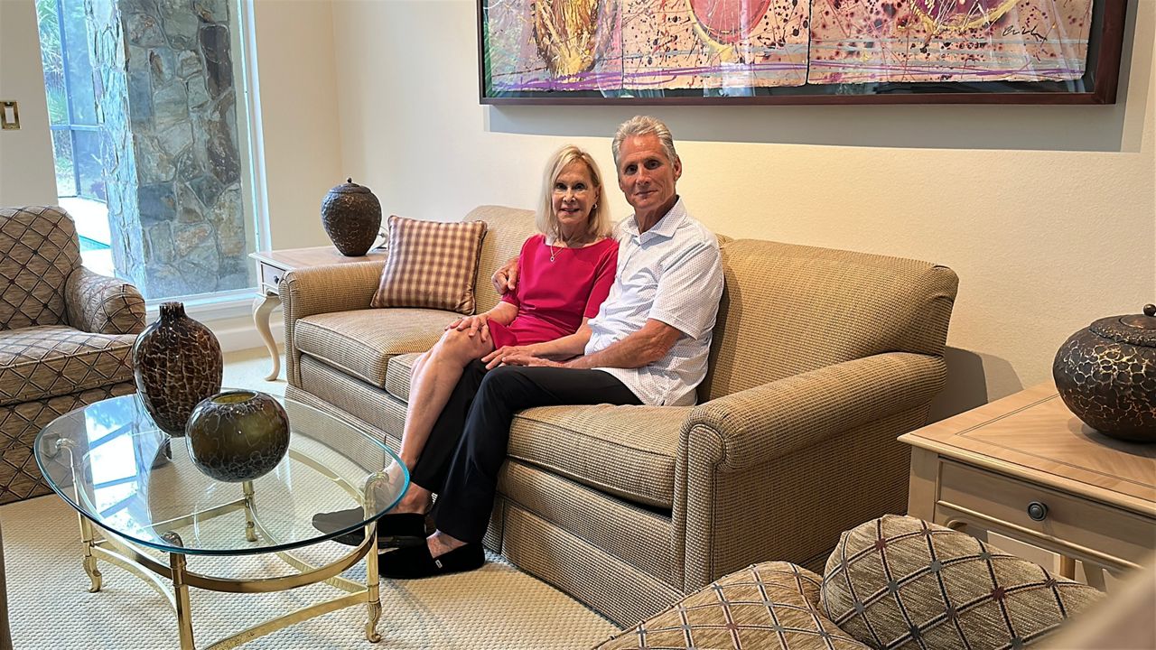 Ken and Joy Davis enjoy sitting in their living room after the U.S. Government helped them return home from Israel. (Spectrum News/Nick Allen)