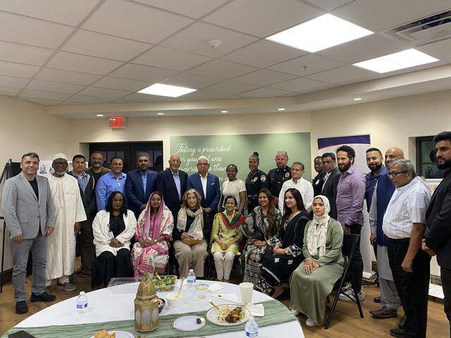 Attendees of Opa-Locka’s first ever city-sponsored Ramadan dinner pose together for a photo in City Hall.