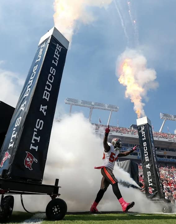 Football player coming out of the tunnel