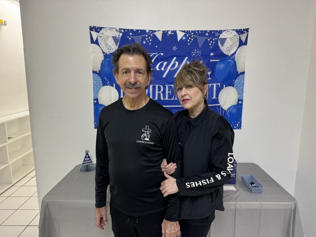 Victor Valiente and Karen Valiente have served at Loaves & Fishes for decades.