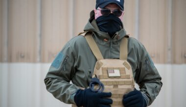 photo of an ICE agent in a mask and uniform