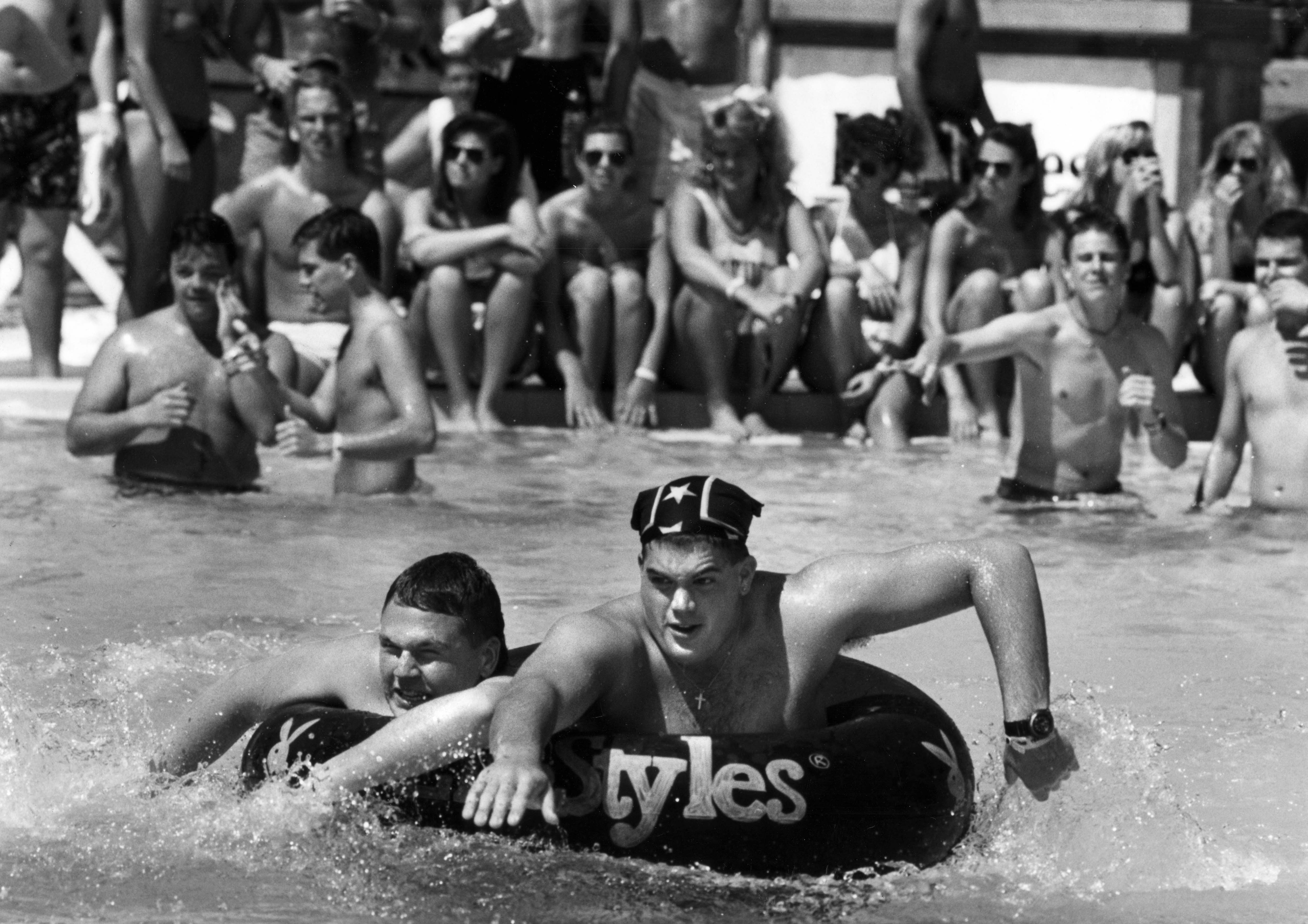 Spring Break 1990. Daytona Beach. Contestants in the inner-tube race...