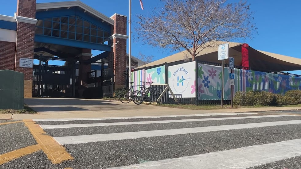 Artwork removed from Hartsfield Elementary's crosswalk last year is now featured on a wind...