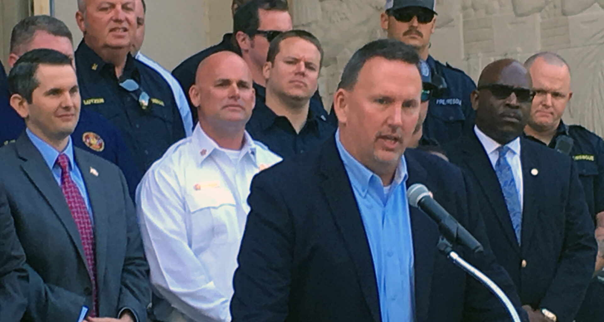 Jacksonville Association of Fire Fighters head Randy Wyse addresses a crowd downtown.