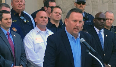 Jacksonville Association of Fire Fighters head Randy Wyse addresses a crowd downtown.