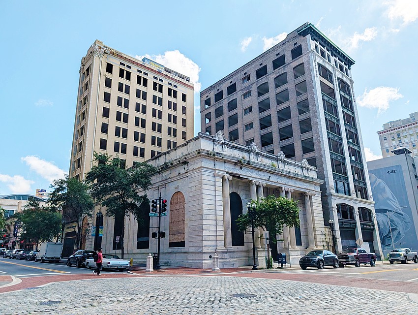 The Laura Street Trio of historic buildings at Forsyth and Laura streets in the core of Downtown Jacksonville. From left, they comprise the Florida Life, Old Florida National Bank, also known as the Marble Bank, and Bisbee buildings.
