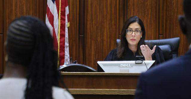 Judge Christine Hernandez, center, makes clear that Jahara Malik, left, understands the consequence of pleading guilty to a manslaughter charge in connection with the 2024 stabbing death of Yahkeim Lollar, a Northwestern student-athlete, in Courtroom 2-8 at the Richard E. Gerstein Justice Building on Monday, March 16, 2026, in Miami, Florida.