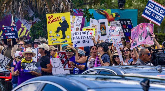 Protesters gather at Tropical Park on Saturday March 28, 2026.