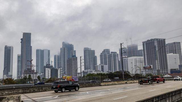 Low clouds hover around the top of Miami skyline buildings in the morning of March 18, 2026. They could reappear Sunday, March 29, during Ultra as there is a 35% rain chance that day.