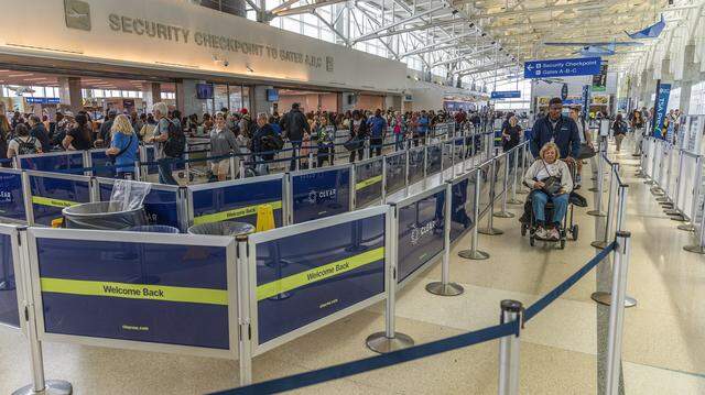 Light passenger traffic is seen at the security checkpoint for gates A, B and C in Terminal 1 at Fort Lauderdale-Hollywood International Airport on Friday, March 20, 2026. Immigration and Customs Enforcement agents will be moving into U.S. airports starting Monday, March 23, 2026, to help relieve long lines for travelers, Trump’s border czar Tom Homan said Sunday on CNN’s “State of the Union.” 