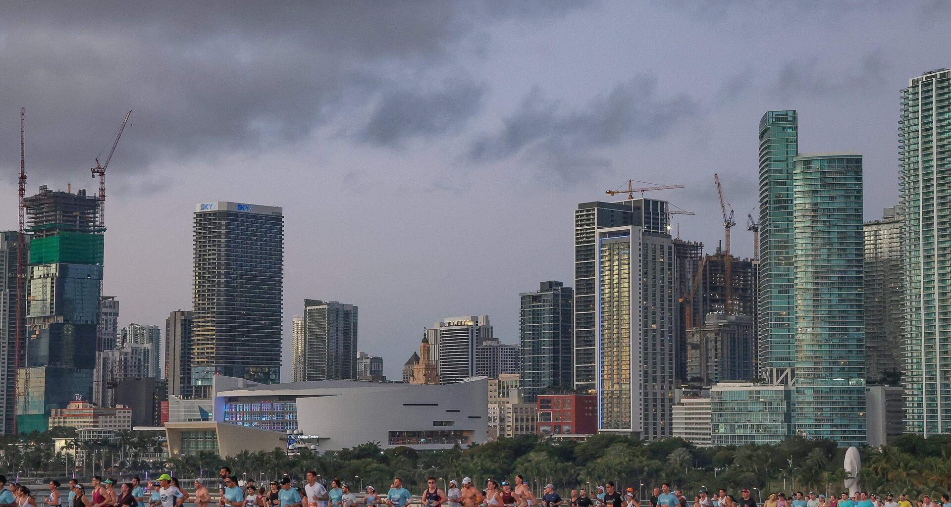 Runners head eastbound on the MacArthur Causeway, against the partial skyline at the Life Time Miami Marathon & Half on Sunday, January 25, 2026, in Miami, Florida.