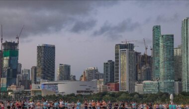 Runners head eastbound on the MacArthur Causeway, against the partial skyline at the Life Time Miami Marathon & Half on Sunday, January 25, 2026, in Miami, Florida.