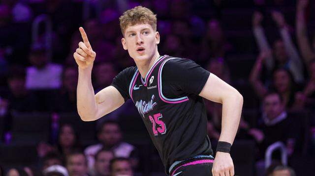 Miami Heat guard Kasparas Jakucionis (25) reacts after scoring against the Orlando Magic in the first half of their NBA game at Kaseya Center on March 14, 2026, in Miami.