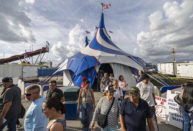 Guest leave the circus tent after watching a performance during the opening day of the 74th annual Miami-Dade County Youth Fair on Thursday, March 12, 2026, in Miami, Fla.